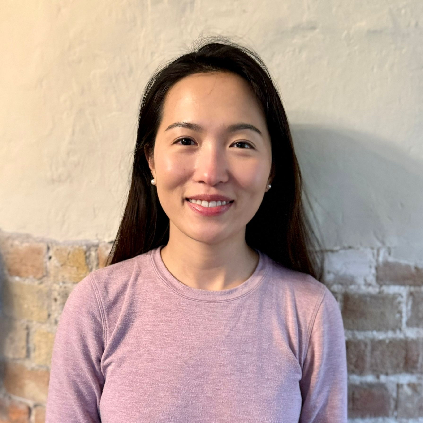 Pei Liao, known as Keke, a certified Pilates instructor in Kent, specializing in equipment-based Pilates and mindful movement.